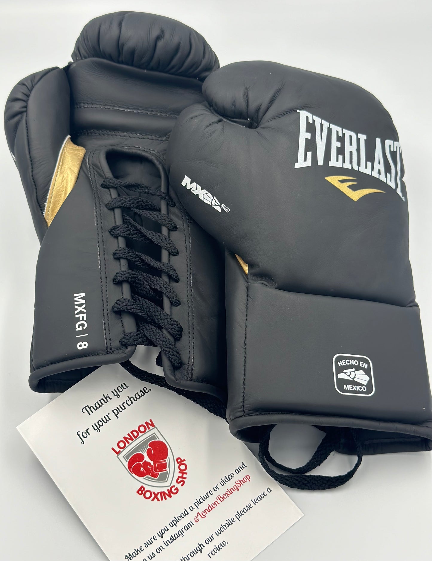 Black/Gold Everlast MX Pro Fight Gloves